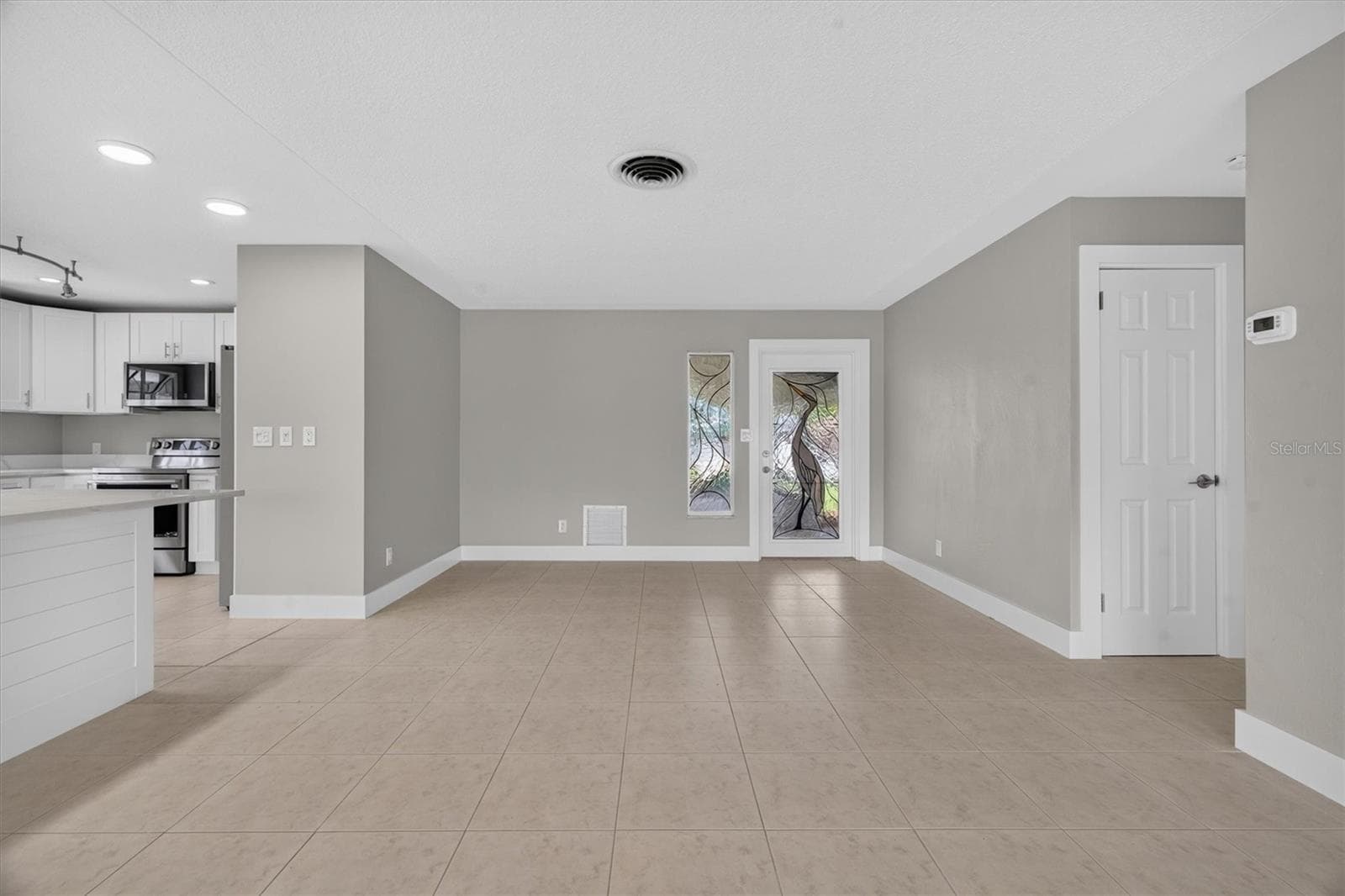 Single Family Residence at 541 LILLIAN DR, MADEIRA BEACH, photo 12 of 61