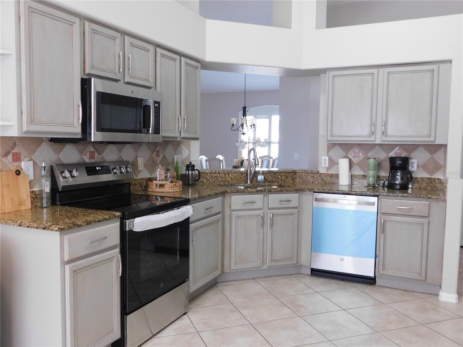 Brand New GE Stainless Steel Range, Microwave and Dishwasher - Never used. - 30600 NICKERSON LOOP, WESLEY CHAPEL