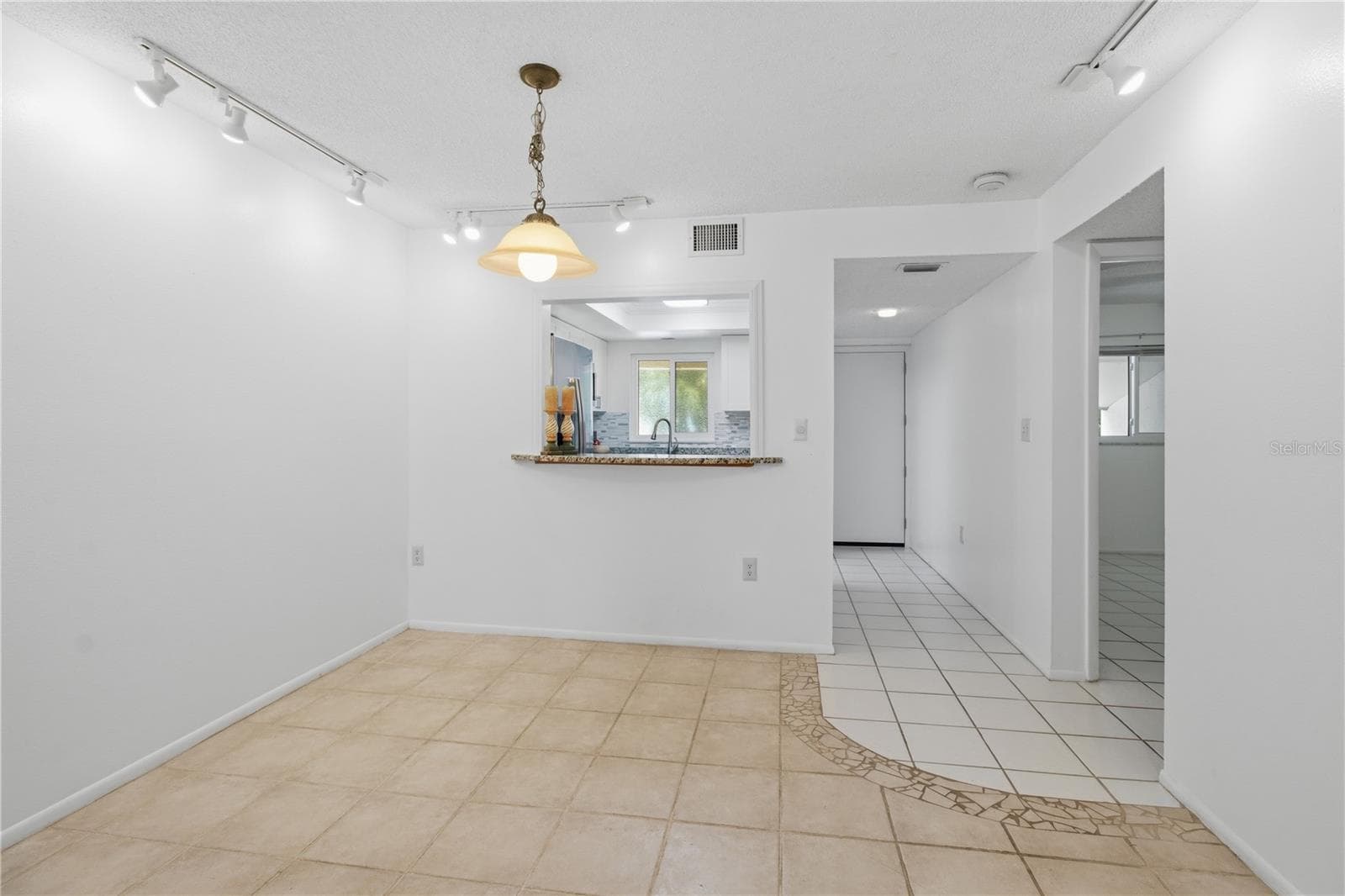 Looking from LR to foyer - 2448 CLUBHOUSE DR #202, SARASOTA