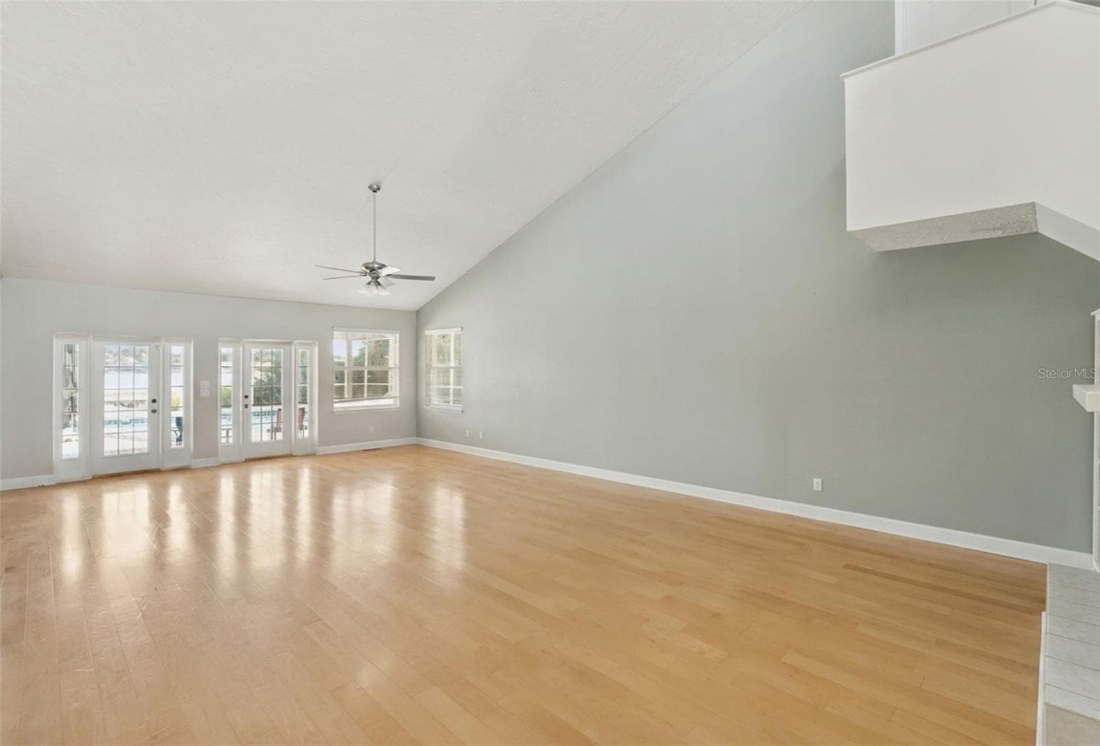 Family room overlooking the pool and patio. - 25 LAKEWOOD CSWY, WINTER HAVEN