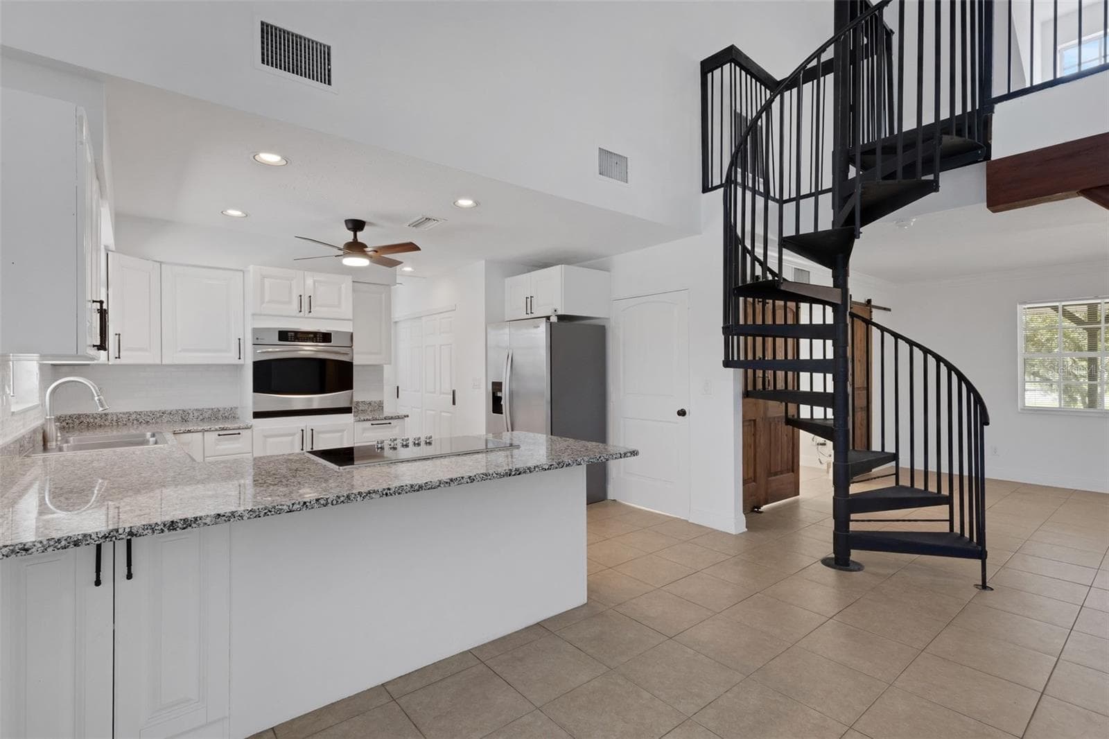 Kitchen/Stairs to Loft - 28706 102ND DR E, MYAKKA CITY