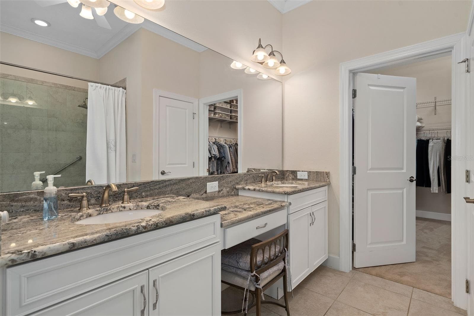 Primary En-Suite with Comfort Height Vanity, Oversized Walk-in Closet and a Water Closet for your privacy - 1197 ESPERANZA RIDGE RD, CLERMONT