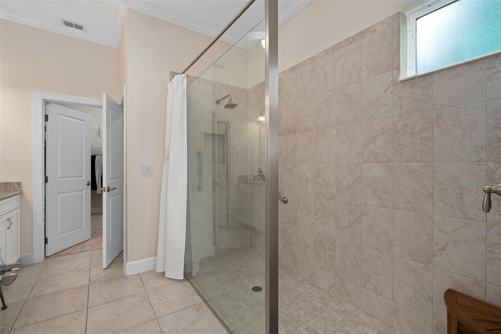 Primary En-Suite Shower with Upgraded Wall and Floor Tile - 1197 ESPERANZA RIDGE RD, CLERMONT