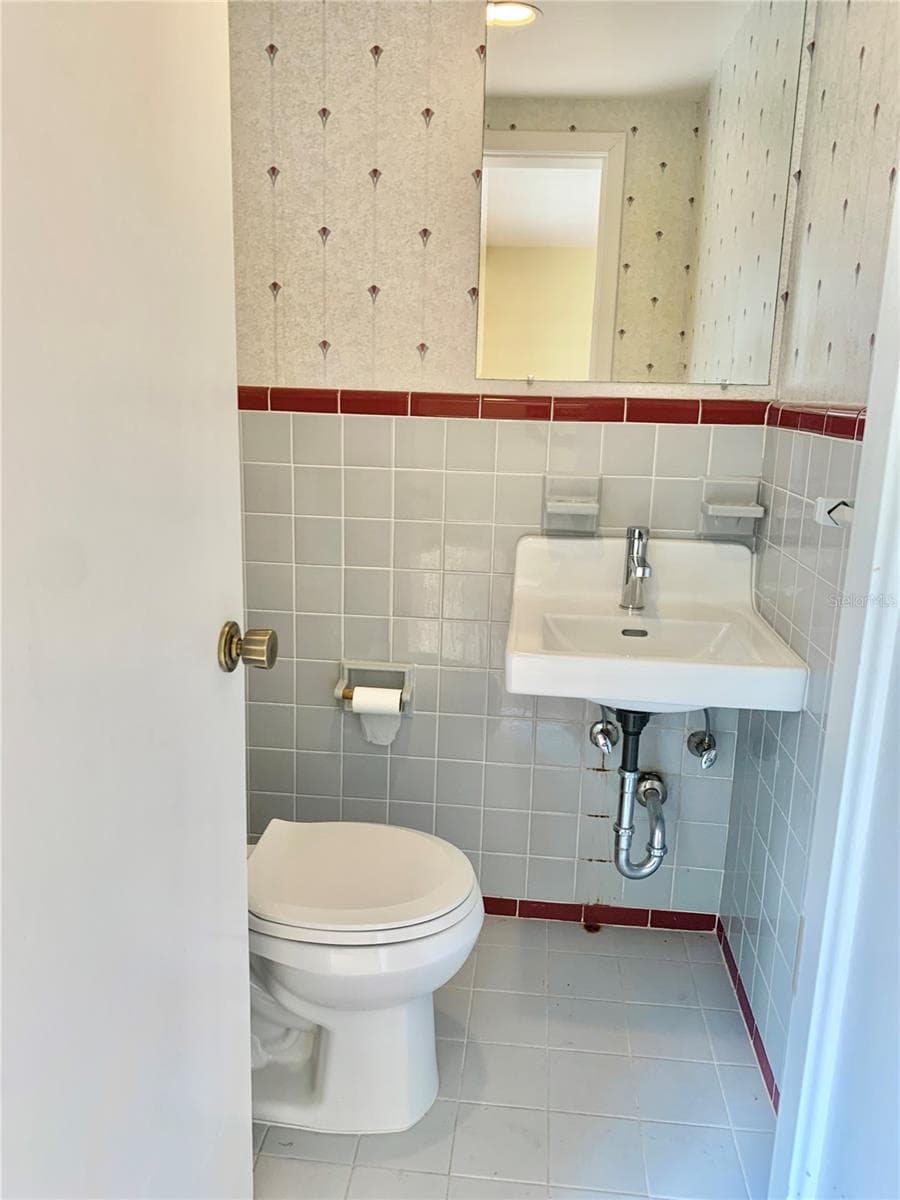 Half Bath in Family Room - 2238 NW 16TH AVE, GAINESVILLE