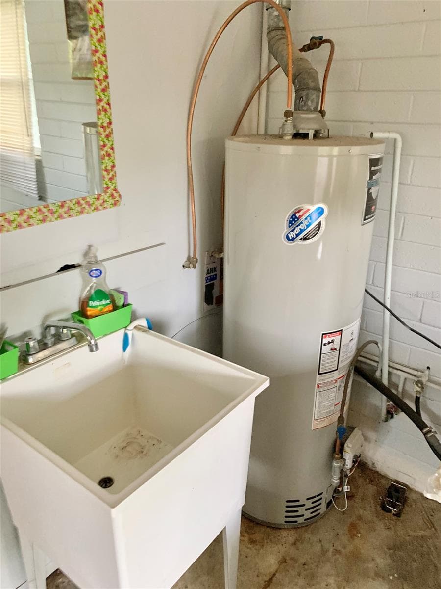 Hot water heater and laundry tub - 2238 NW 16TH AVE, GAINESVILLE