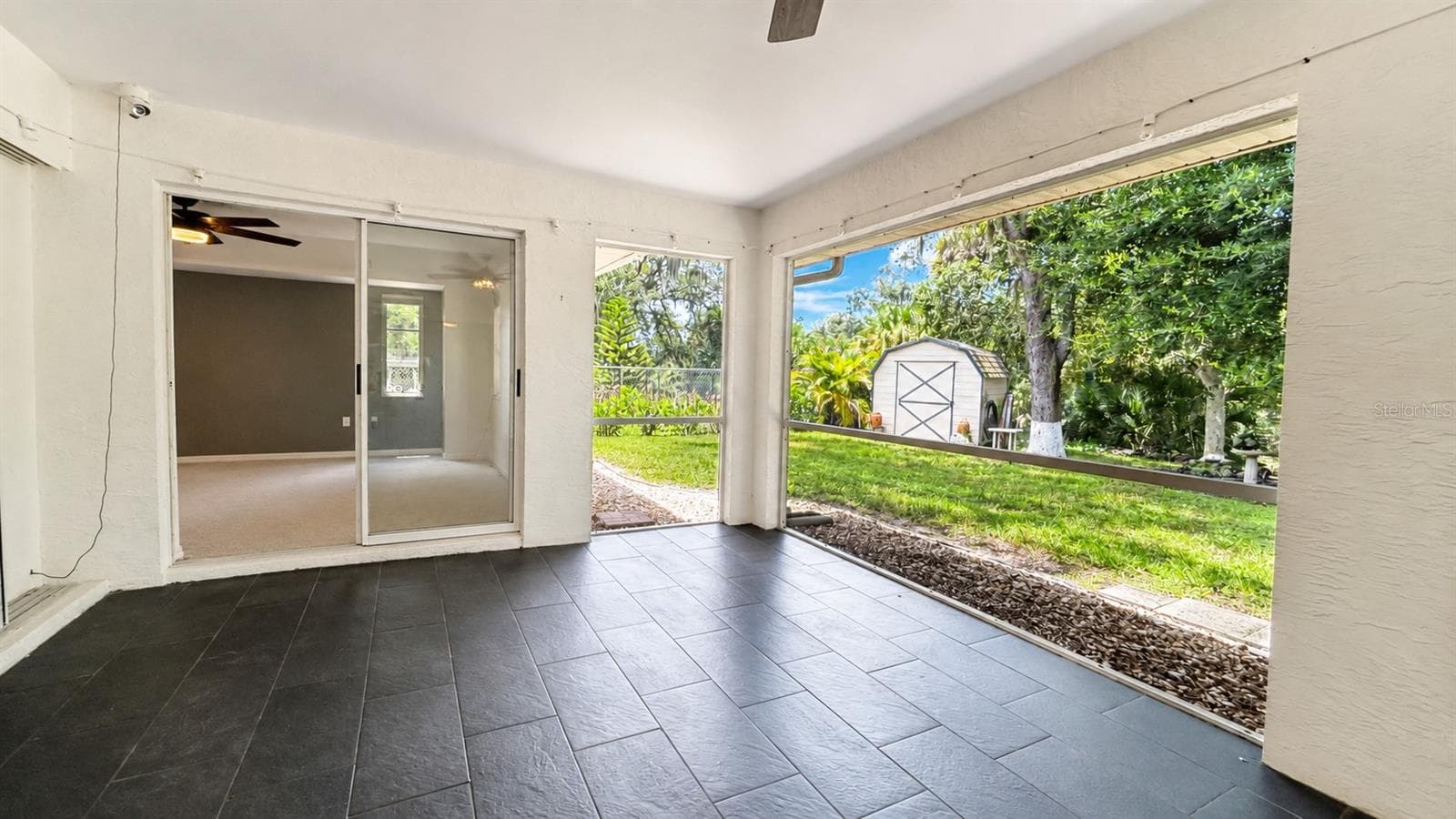 New crystal clear backyard views, courtesy of the new lanai screens - 297 FLAMINGO BLVD, PORT CHARLOTTE