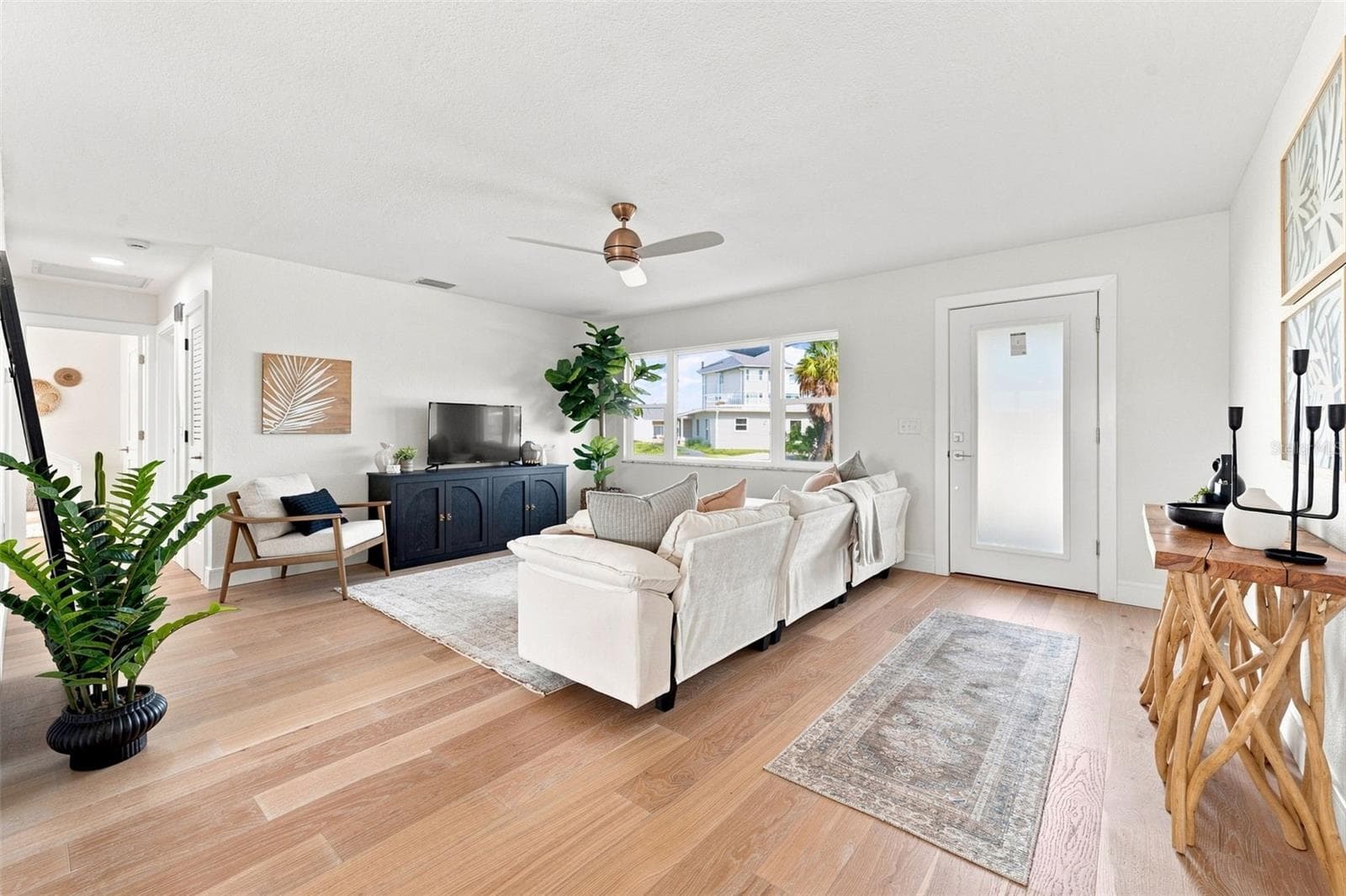 Light and bright living room. - 360 145TH AVE E, MADEIRA BEACH