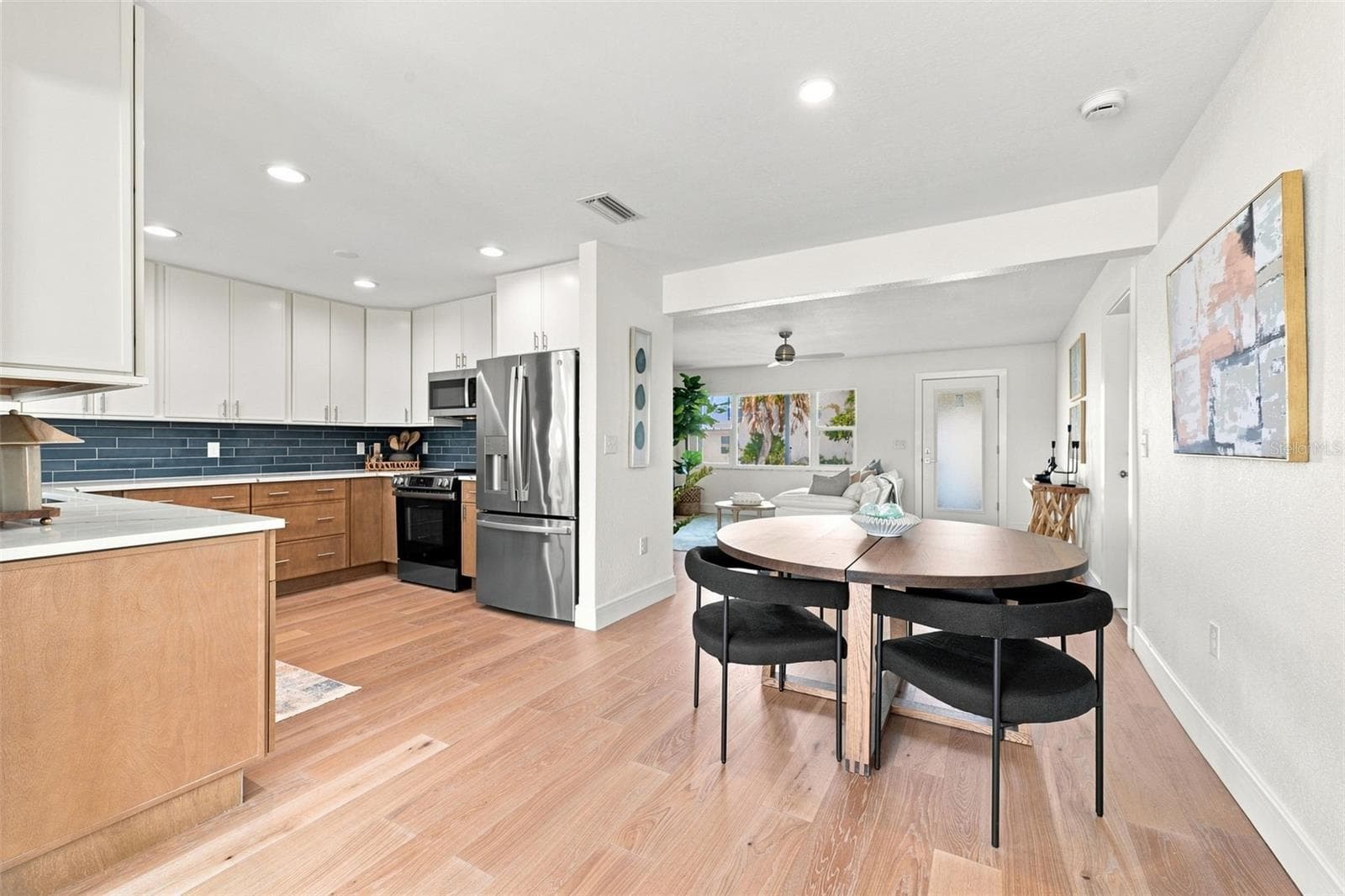 Great space for cooking and dining. - 360 145TH AVE E, MADEIRA BEACH