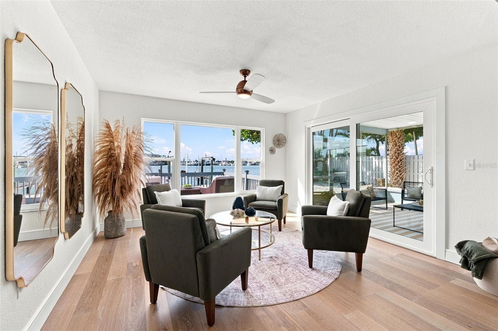 Kick back and take in the view in the family room. - 360 145TH AVE E, MADEIRA BEACH