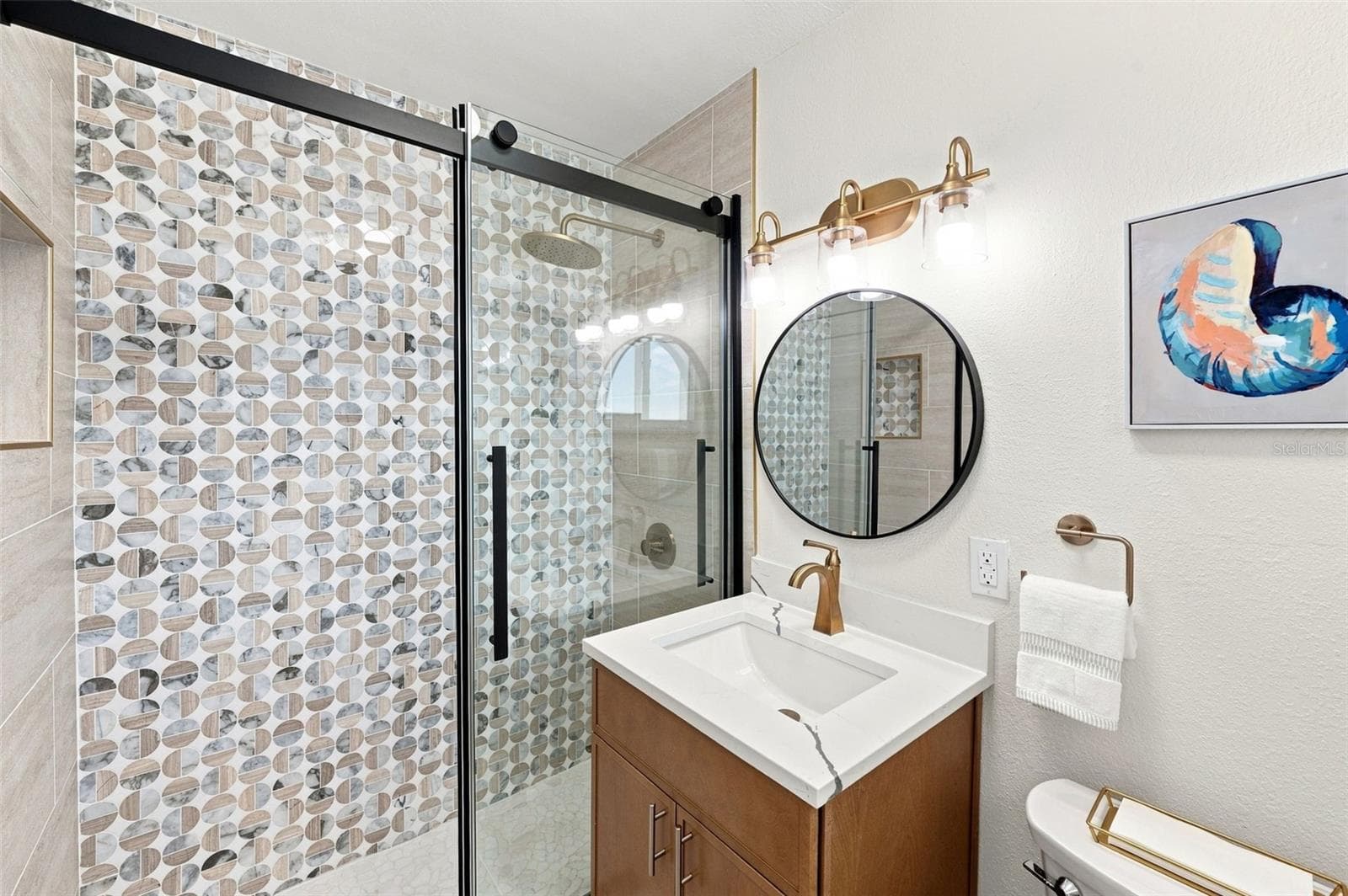 Primary bathroom with beautiful shower. - 360 145TH AVE E, MADEIRA BEACH