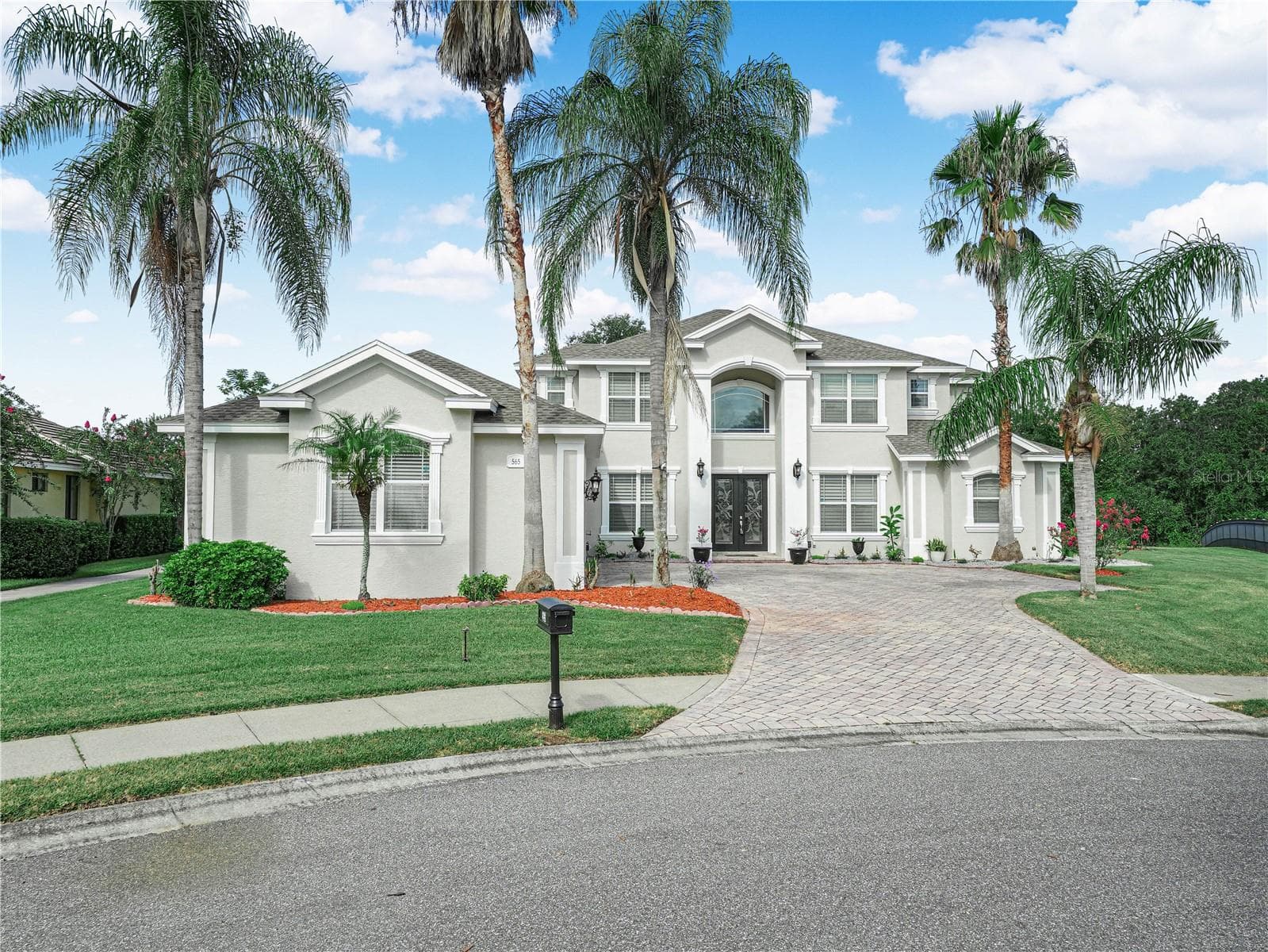 565 WHISPER WOODS DR