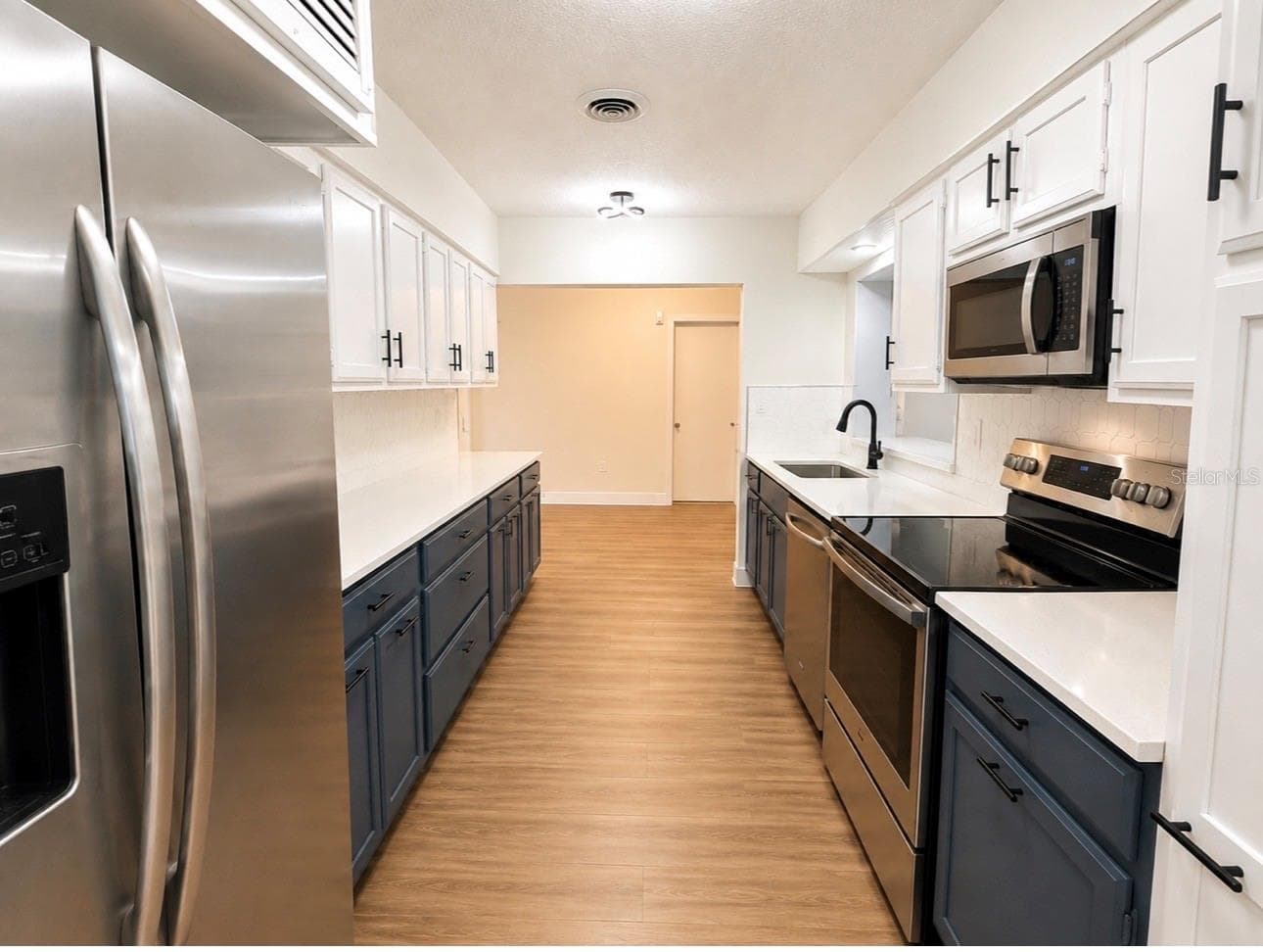 Single Family Residence at 3101 FLOWERTREE RD, BELLE ISLE, photo 11 of 65