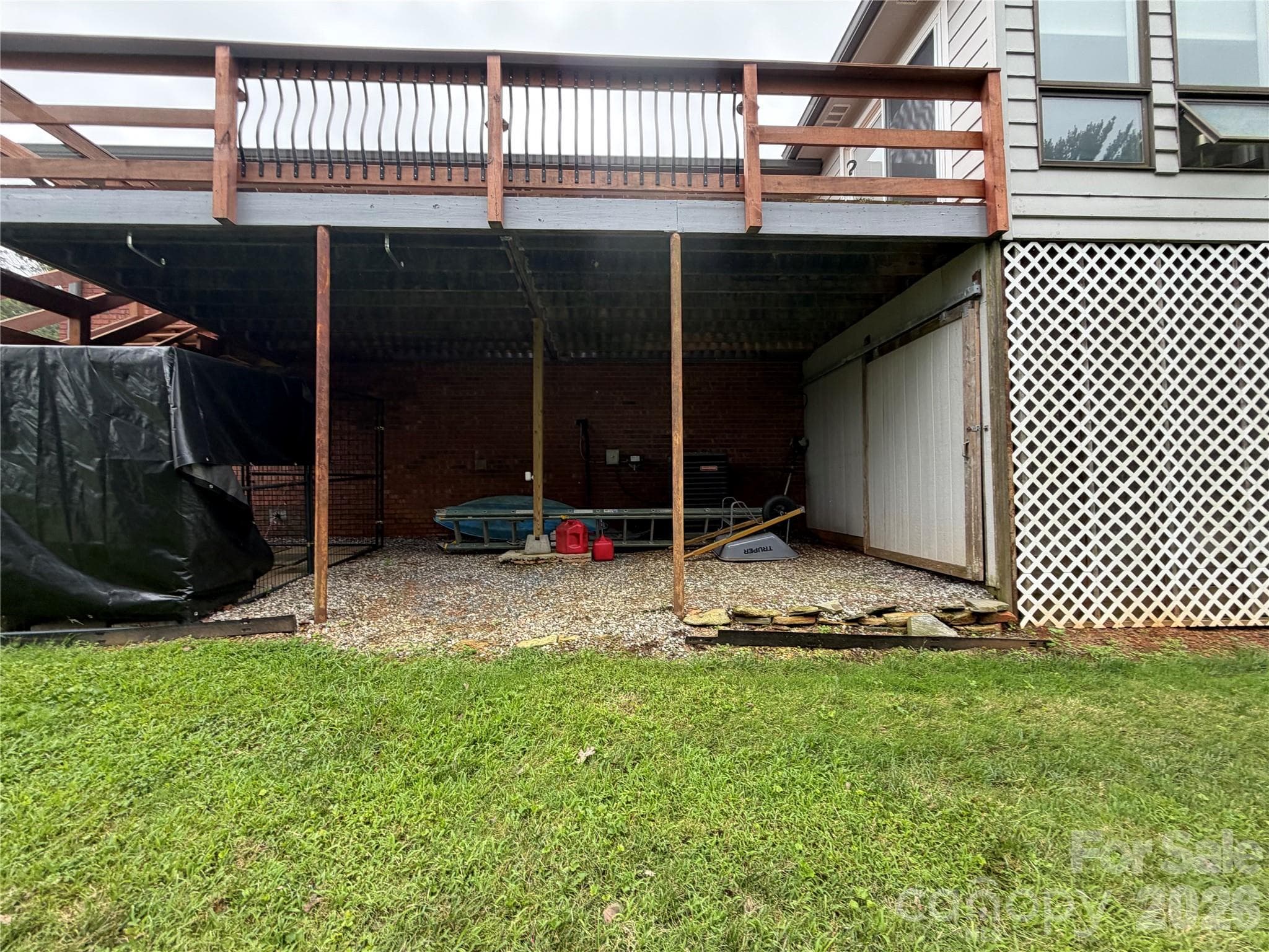 Rear deck off Sun Room with storage space below - 1000 Beaumont Poplar Street, North Wilkesboro
