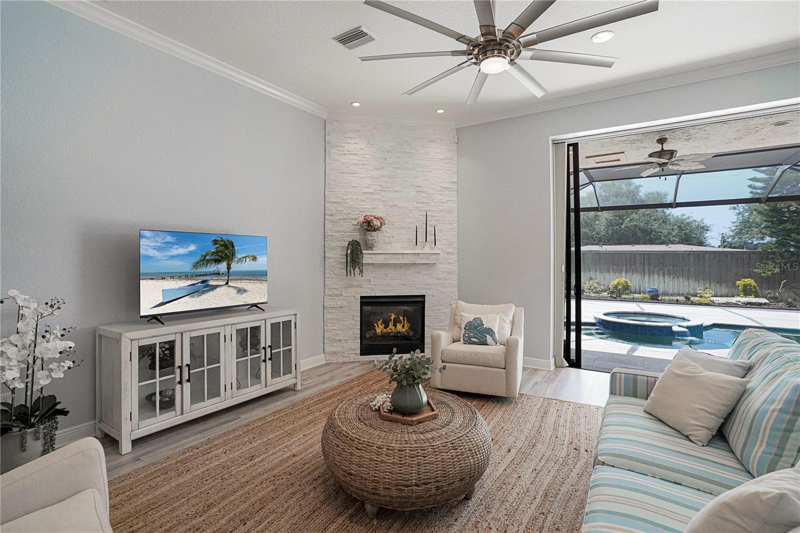 Living Room with pool view - 1650 ASSISI DR #16, SARASOTA