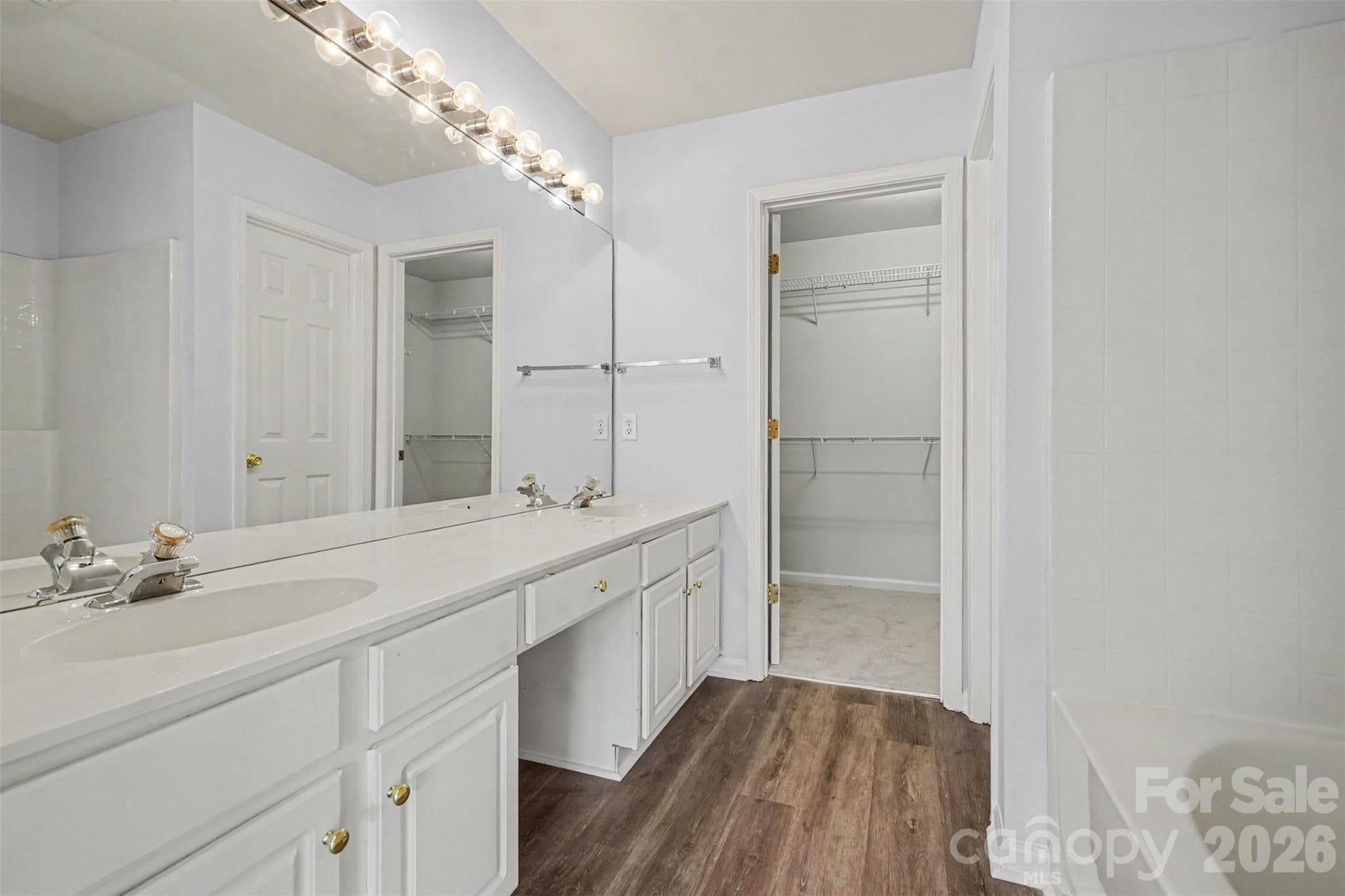 Primary bath with big walk in closet - 2410 Normancrest Court, Charlotte