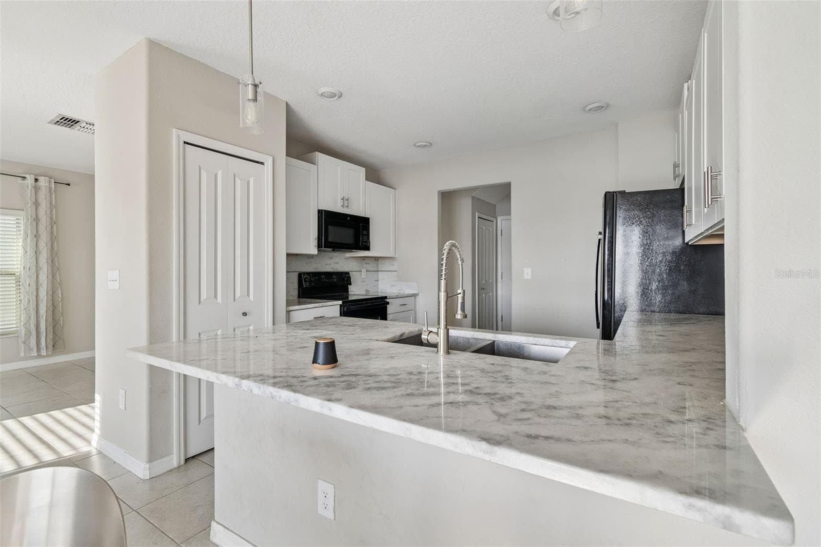 Single Family Residence at 4410 SUMMER SAVORY ST, TAMPA, photo 11 of 64