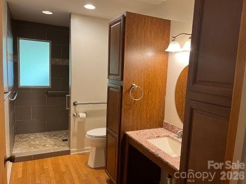 Wow just wow! Look at this spacious 5'10 x 12'8 bath space, grab bar assists featuring the floor to ceiling storage towers (right side has pullout drawers), granite sink area, tall commode and 3'4 x 5'10 tiled shower system with double shower heads - 1211 Sharon School Road, Stony Point