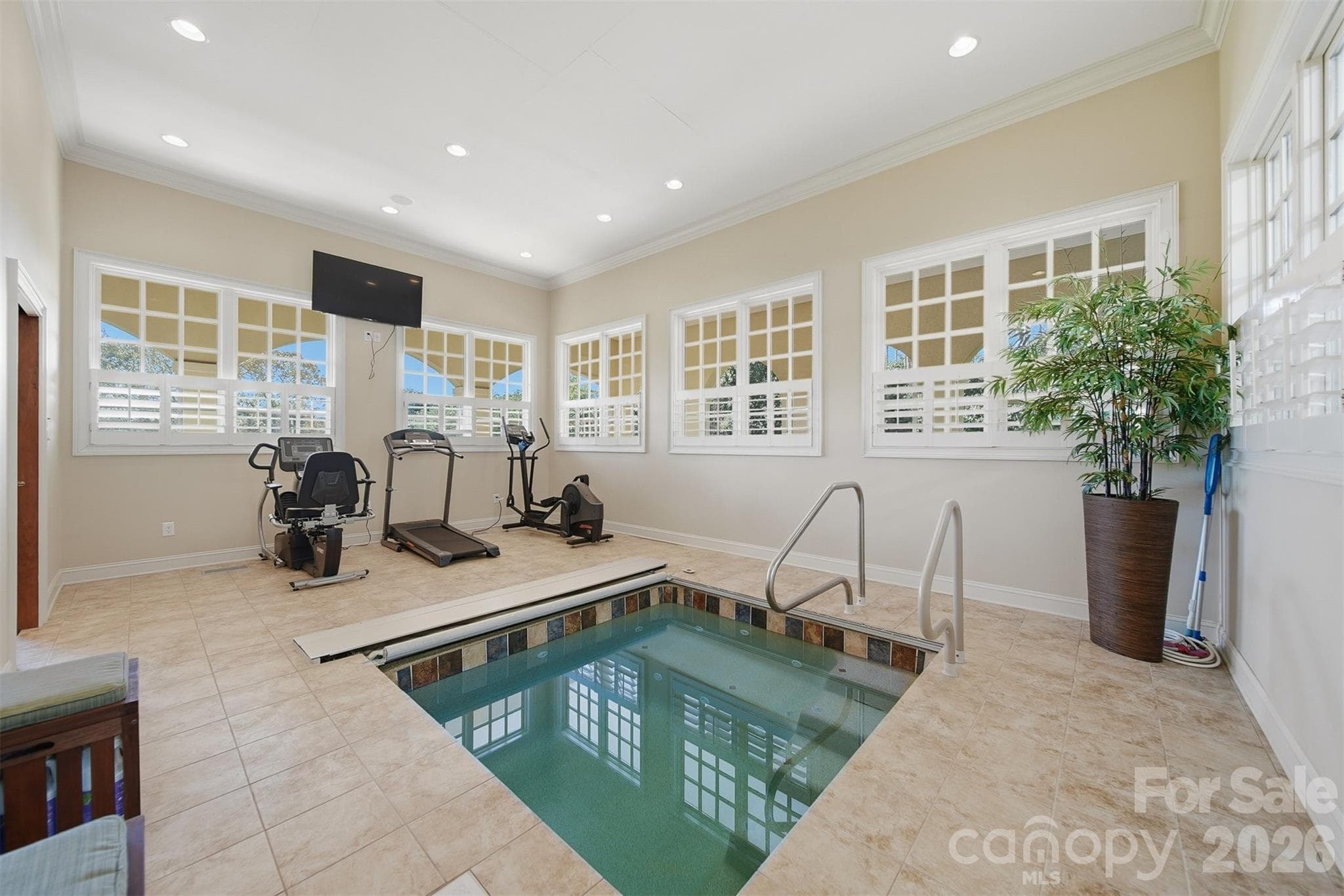Exercise room featuring a built-in hot tub for ultimate relaxation and wellness. - 3619 Links Drive NE, Conover