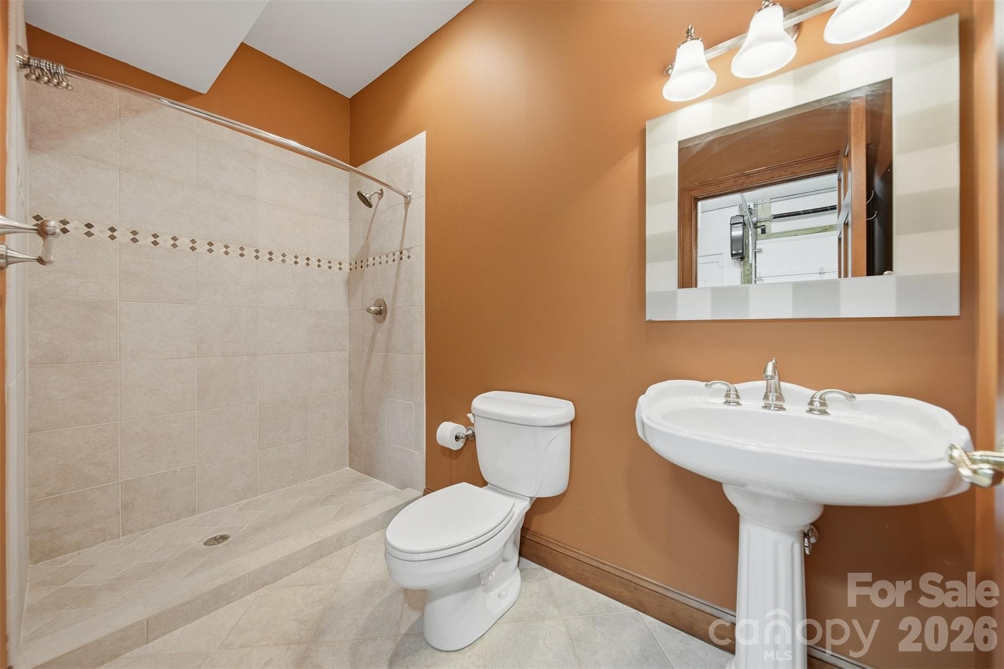 Additional full bath conveniently located in lower level garage area. - 3619 Links Drive NE, Conover