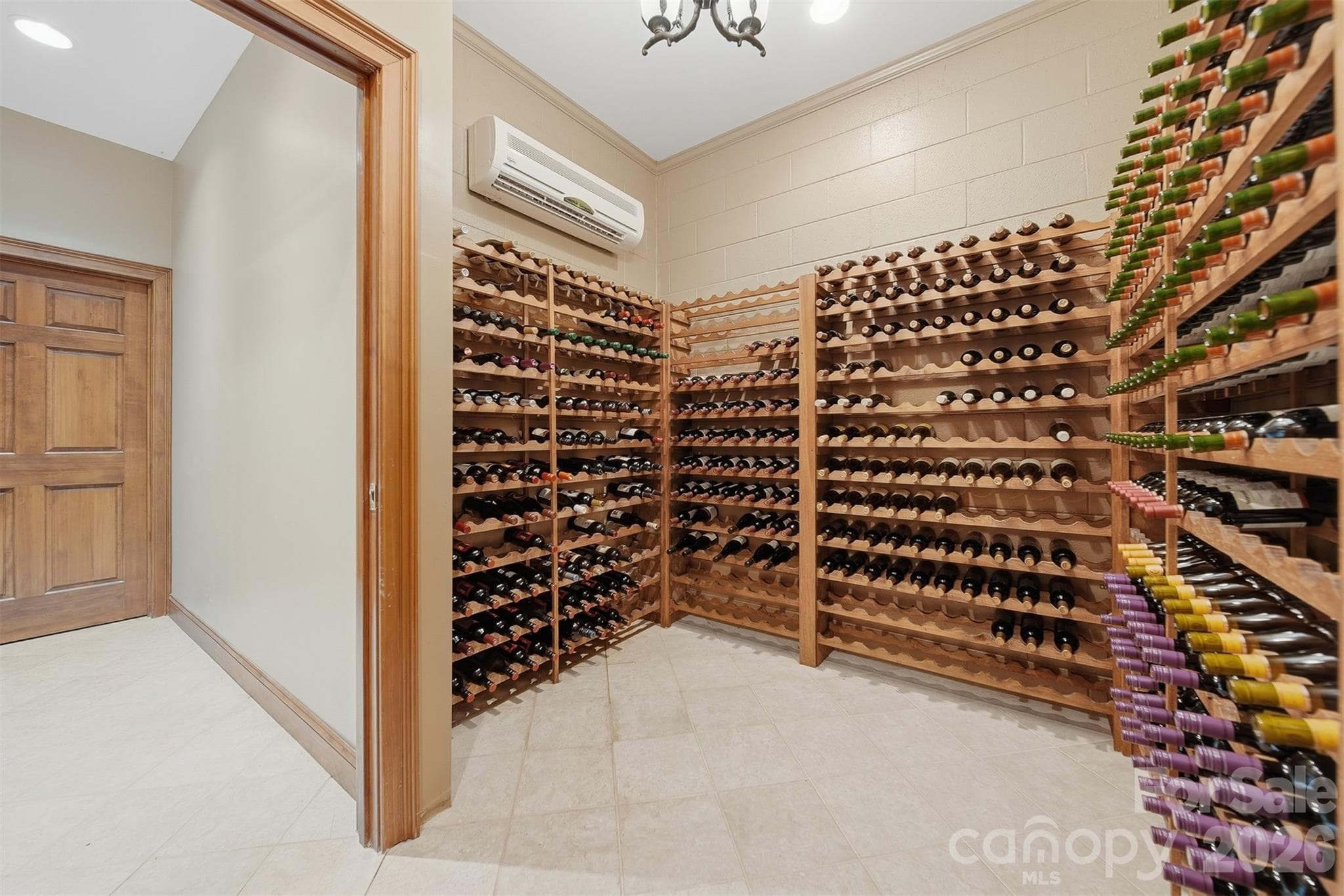 Temperature-controlled wine cellar ideal for collectors and wine enthusiasts. - 3619 Links Drive NE, Conover