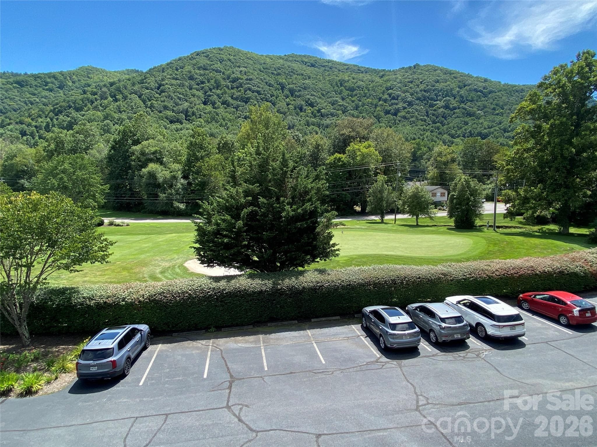 View of  of the 8th hole from covered balcony. - 65 Glenview Lane, Maggie Valley