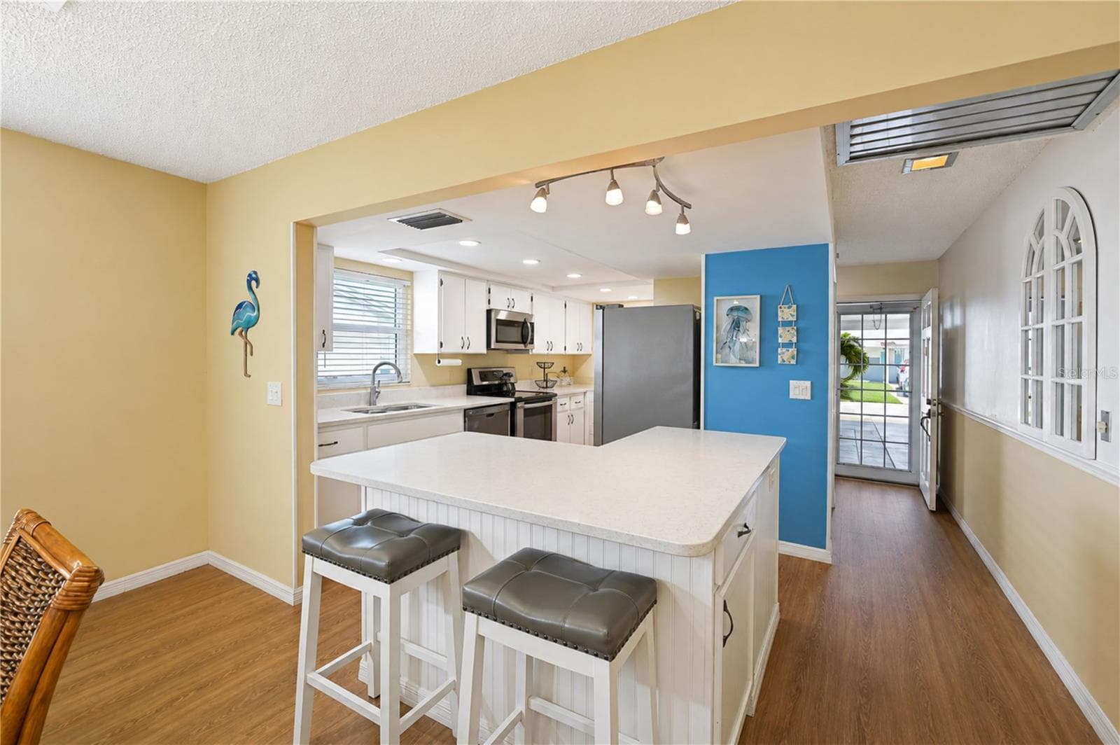View over island to kitchen - 9406 ANDOVER CIR, BRADENTON