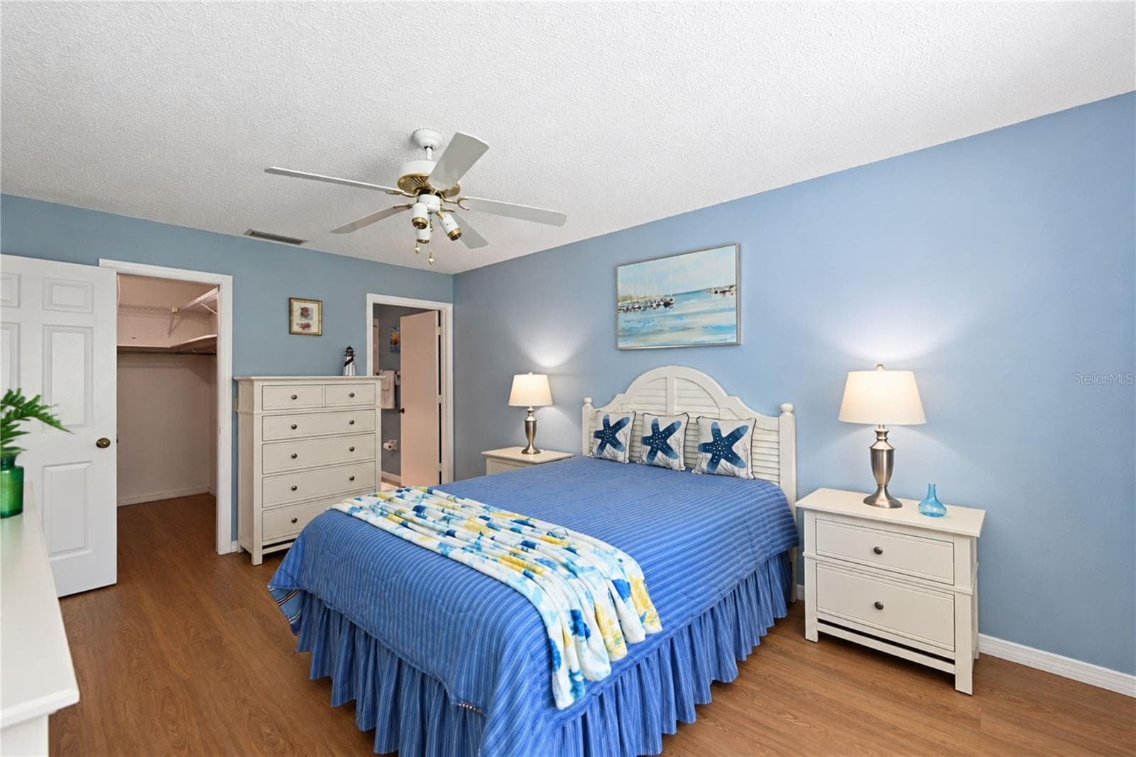 Primary bedroom to walk-in closet and ensuite bathroom - 9406 ANDOVER CIR, BRADENTON