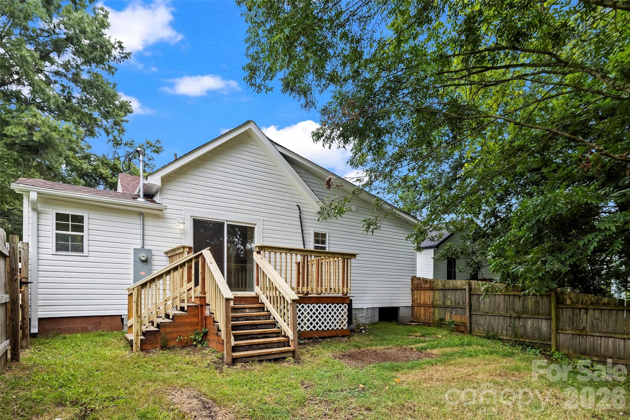 back of house, deck anf fenced backyard - 605 Kings Mountain Street, Clover