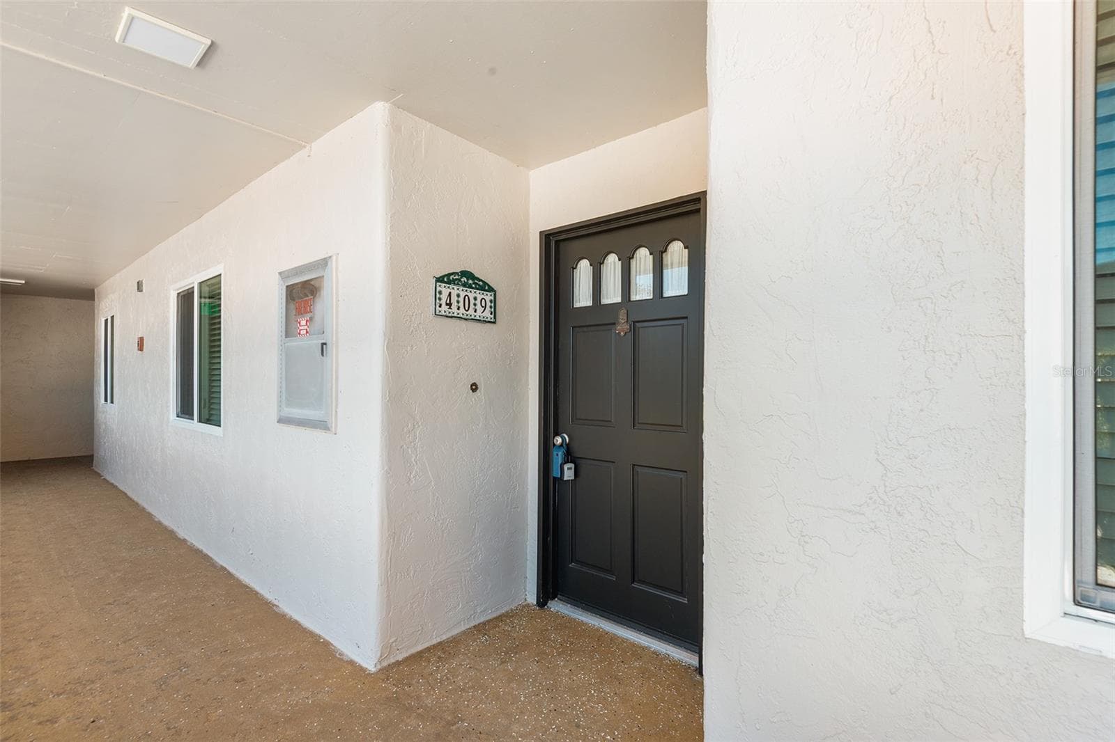 Entry door - 1776 6TH ST NW #409, WINTER HAVEN