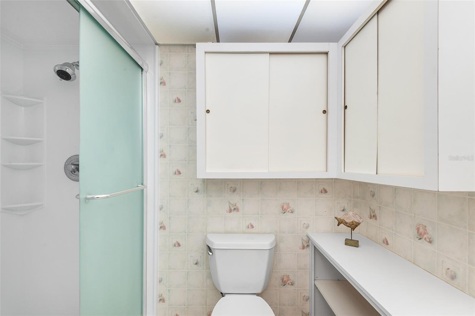 Primary bath with walk in shower - 1776 6TH ST NW #409, WINTER HAVEN