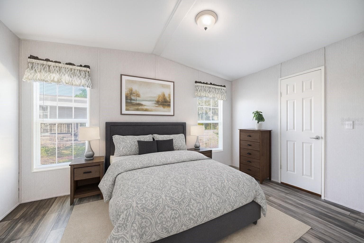 Secondary Bedroom with En Suite. Virtually staged. - 1 BEAVERKILL DR, LAKE WALES