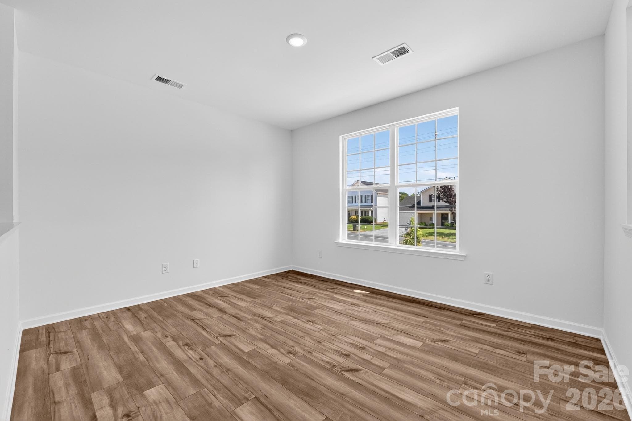 Living RoomPhoto is representative actual colors may vary - 9411 Old Dowd Road, Charlotte