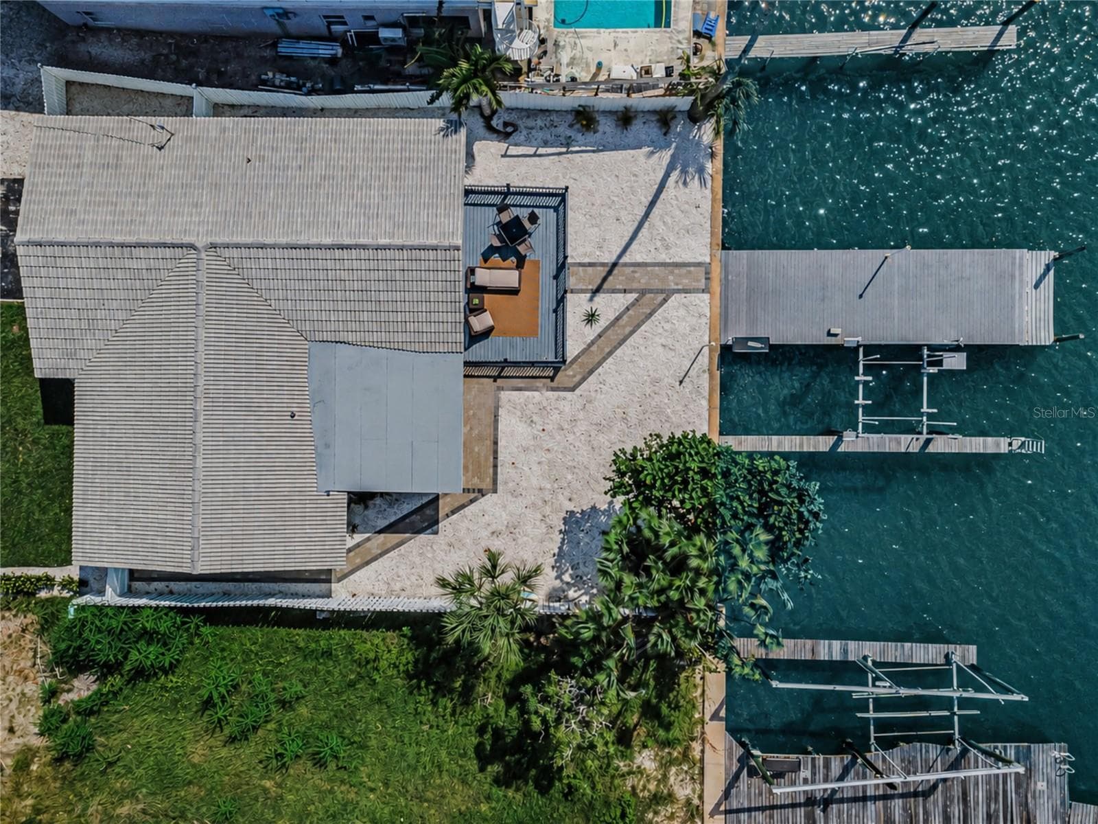 Tile roof and low maintenance landscape. - 360 145TH AVE E, MADEIRA BEACH