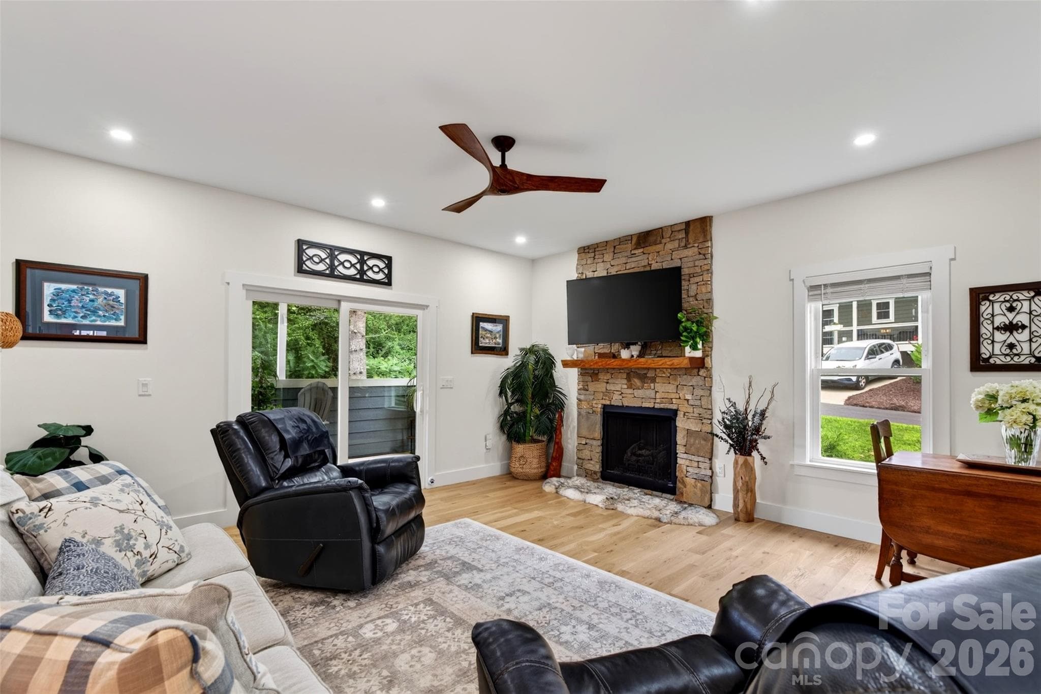 Living room with cozy fireplace - 310 Magnolia Ridge Road, Swannanoa