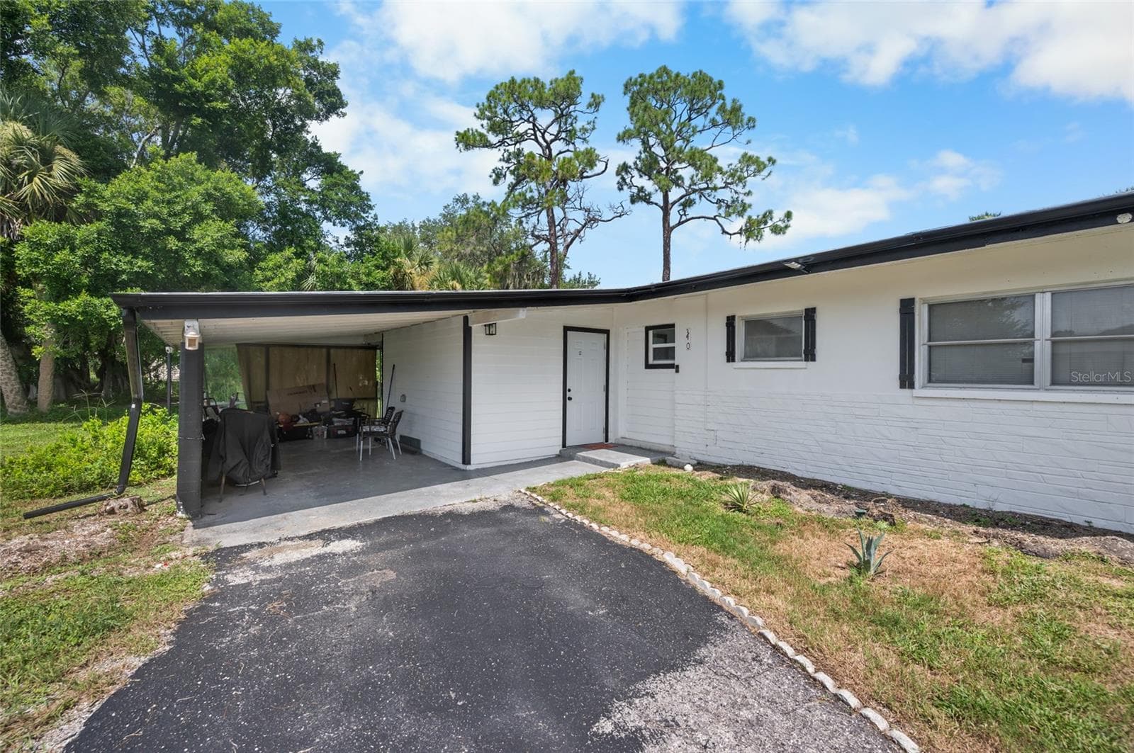 Carport - 340 TIMBRUCE LN NW, PORT CHARLOTTE
