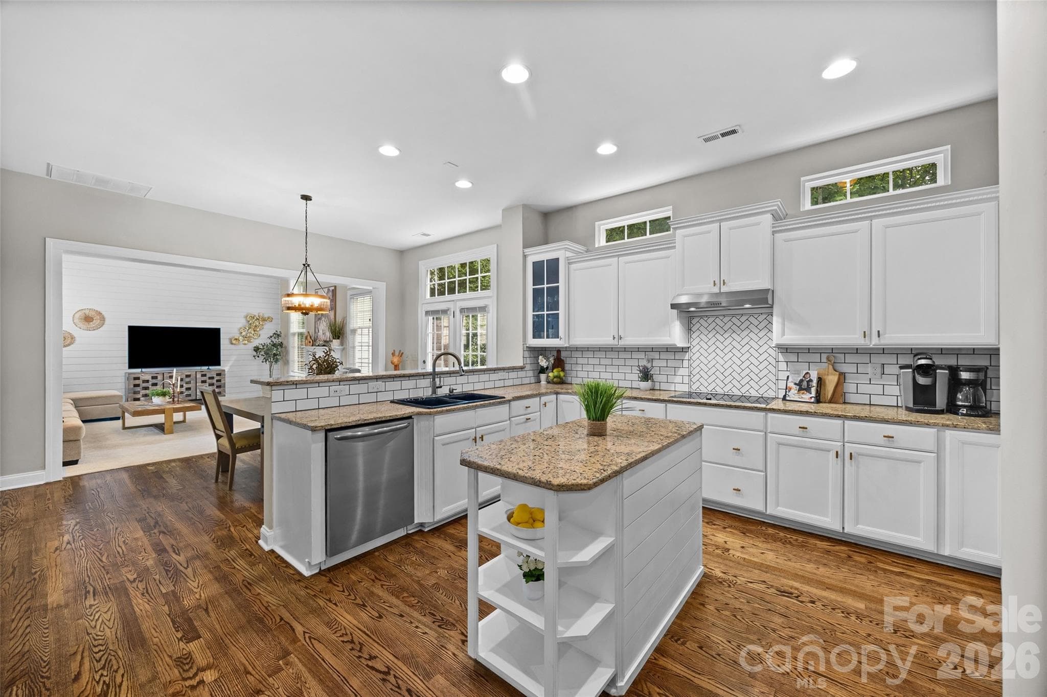 Spacious kitchen with. granite countertops, tile backsplash and SS appliances - 2209 Trading Ford Drive, Waxhaw