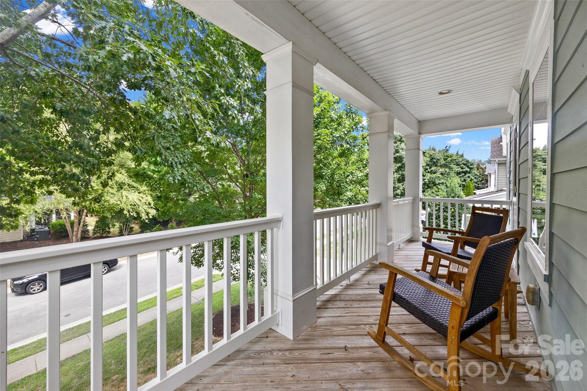 Charming balcony on front of house accessible from bedrooms 5 and 6 - 2209 Trading Ford Drive, Waxhaw