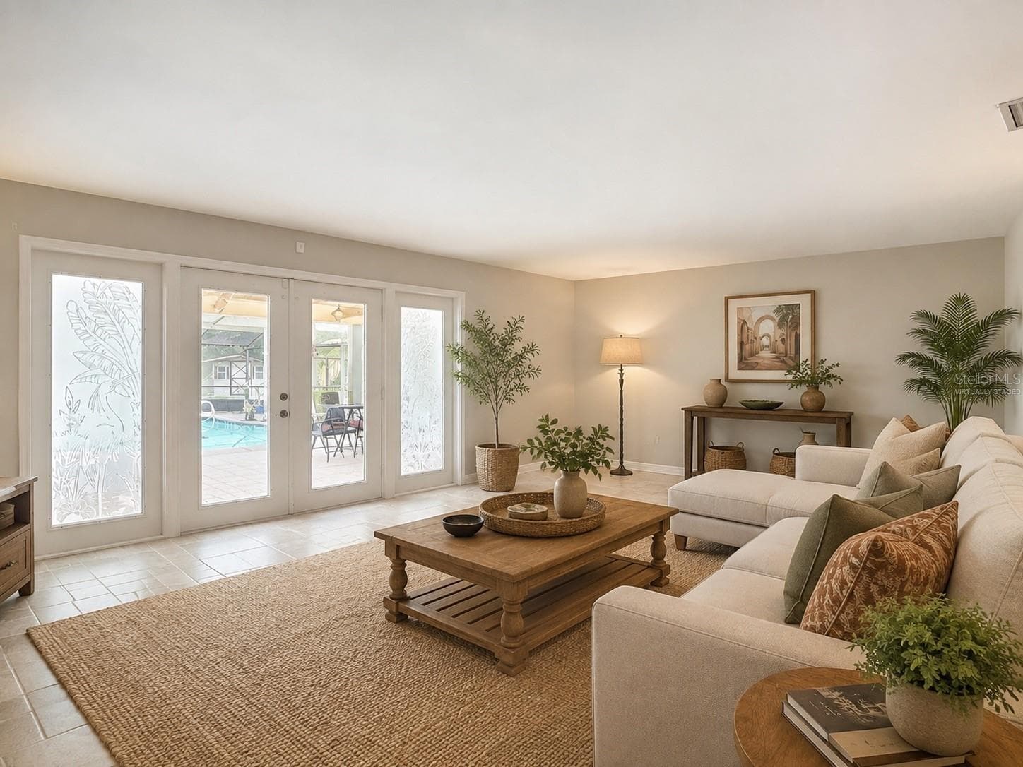 Virtually Staged Family Room overlooking Lanai - 2269 COUNTRY CLUB DR, DELAND