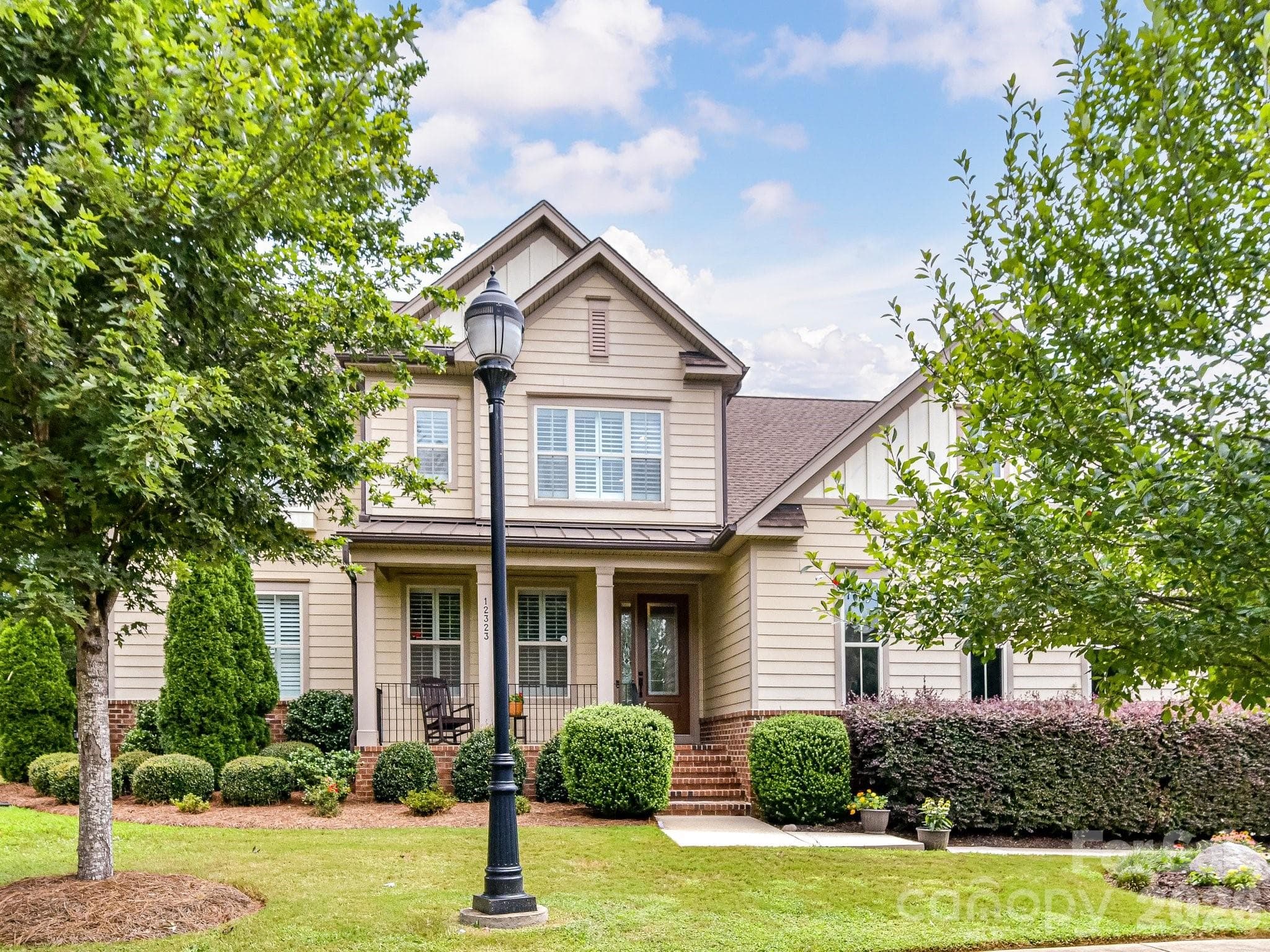 Set on a private .59 acre cul-de-sac lot. - 12323 Cherrybark Lane, Charlotte