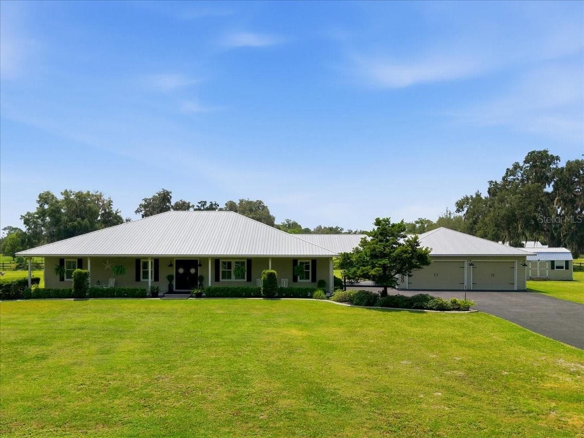 Full view of House with Garage - 1500 SPRING GARDEN RANCH RD, DE LEON SPRINGS