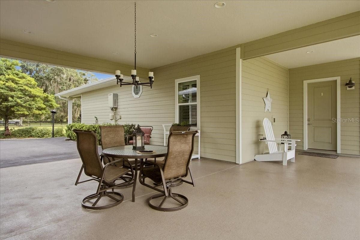 Breezeway between main house kitchen & garage - 1500 SPRING GARDEN RANCH RD, DE LEON SPRINGS