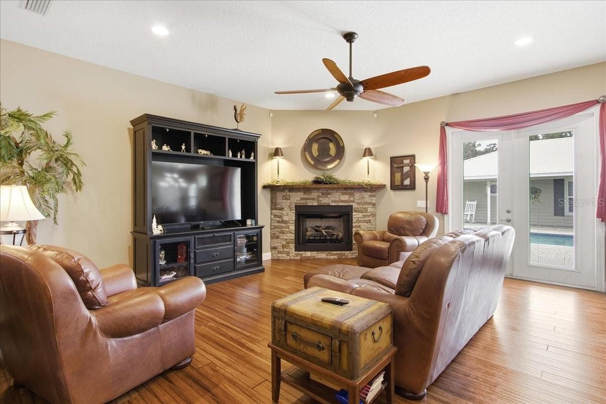 Living Room with Gas  Fire Place - 1500 SPRING GARDEN RANCH RD, DE LEON SPRINGS