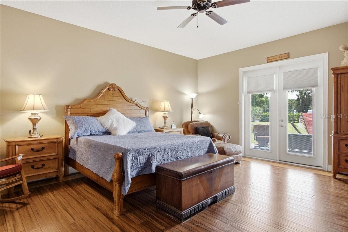 View of Primary Bedroom w/view of outdoor - 1500 SPRING GARDEN RANCH RD, DE LEON SPRINGS