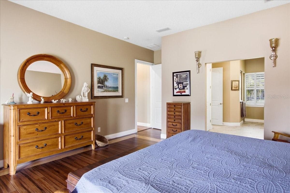 View Primary Bedroom to entry door - 1500 SPRING GARDEN RANCH RD, DE LEON SPRINGS