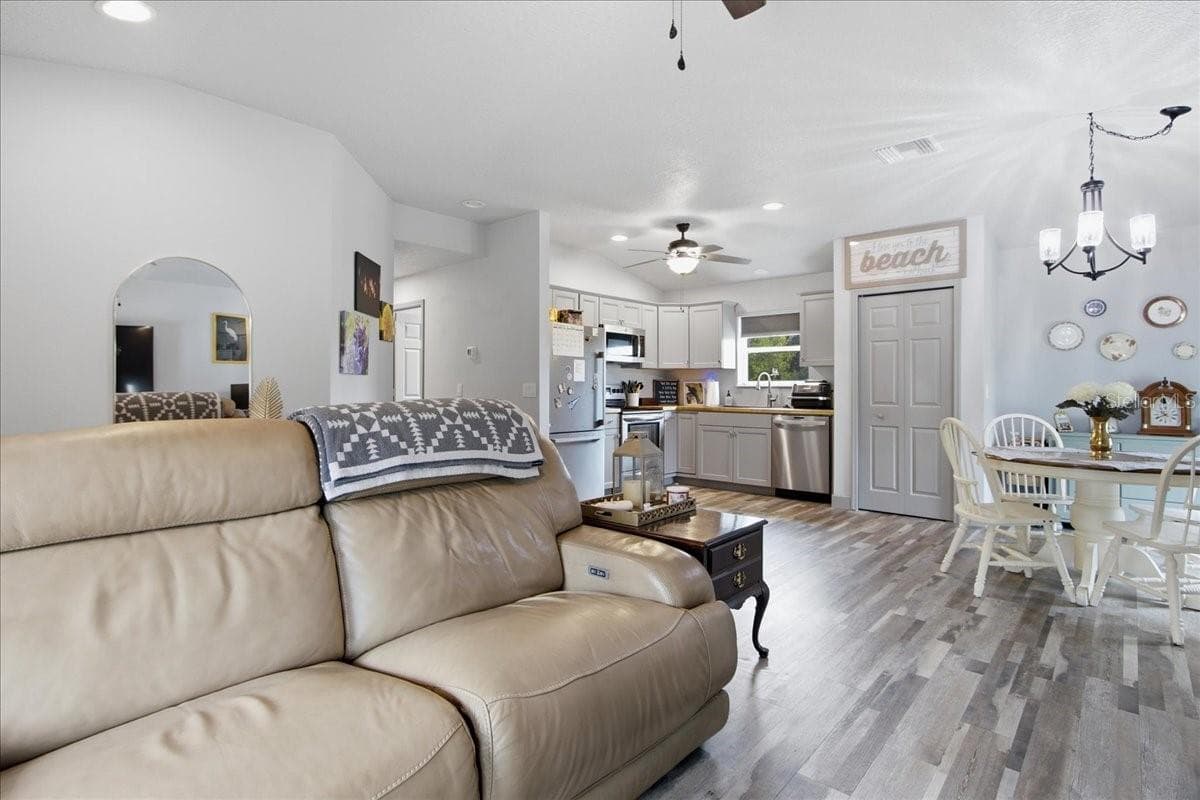 View from Living Room to Kitchen in Guest House - 1500 SPRING GARDEN RANCH RD, DE LEON SPRINGS