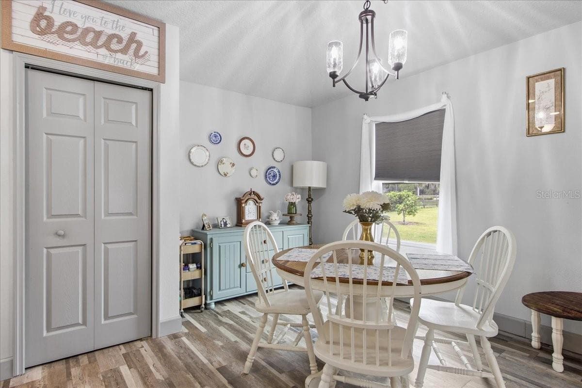 Breakfast/Dinner Area in Guest House - 1500 SPRING GARDEN RANCH RD, DE LEON SPRINGS