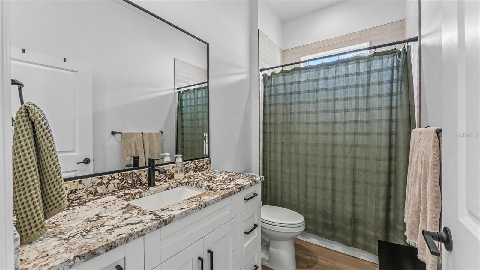 Guest Bathroom 1 - 7034 BENTRIDGE DR, LAKELAND