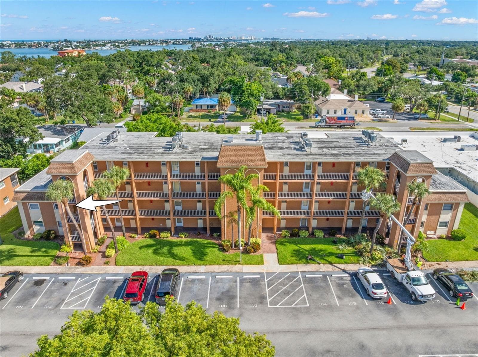 Positioned at the end of the building 1, the 2-bedroom condo benefits from an end-unit location, with mature landscaping surrounding the community. - 12760 INDIAN ROCKS RD #107, LARGO