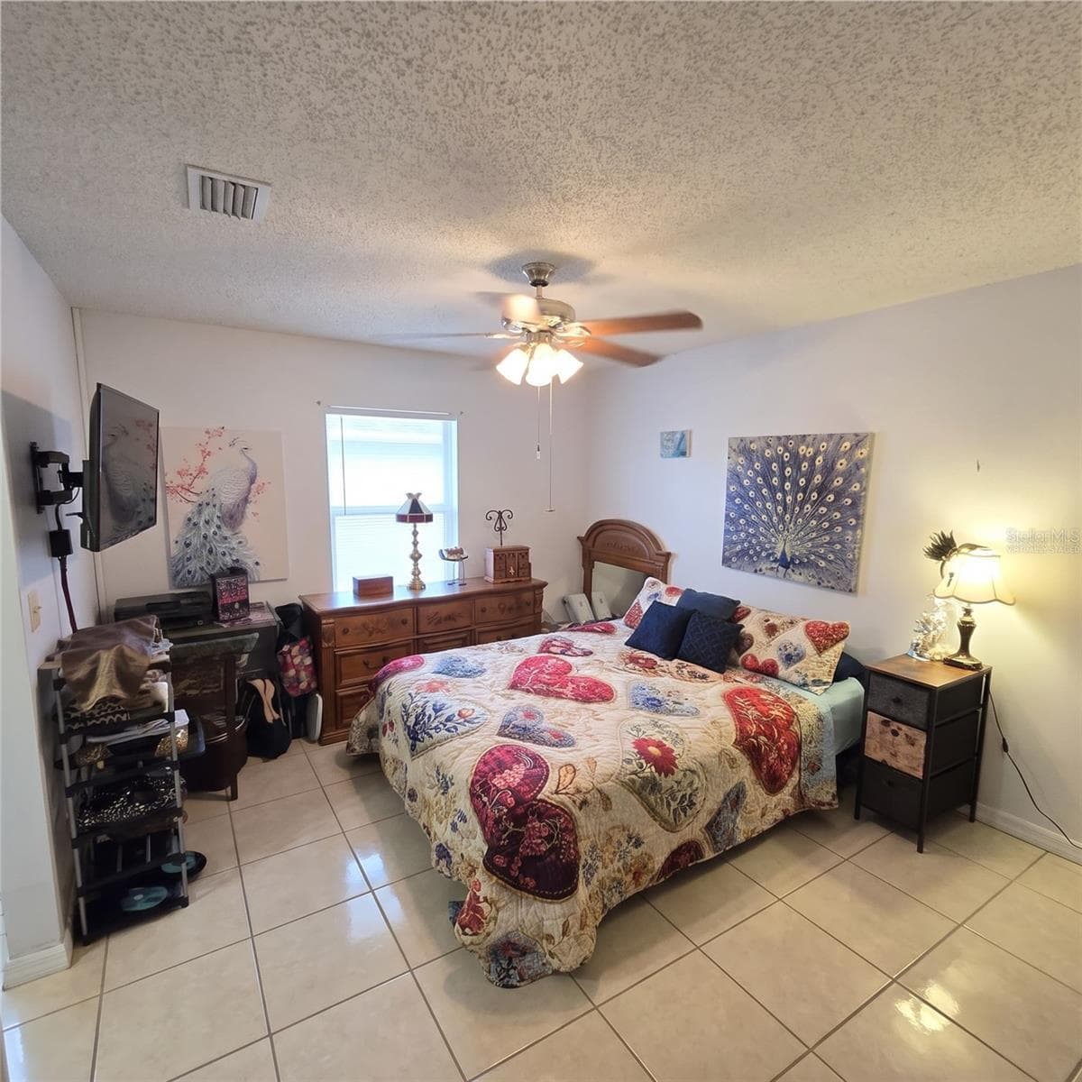 Virtually staged primarily via decluttering -walls and flooring remain the same. - 5045 MISTY LAKE DR, MULBERRY