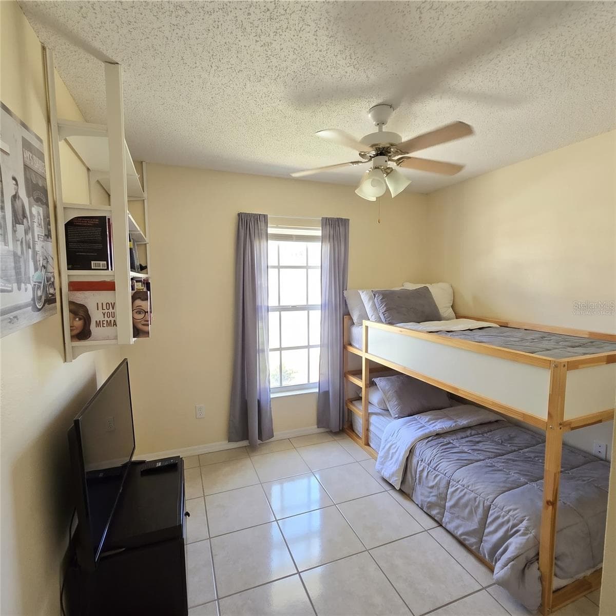 Virtually staged primarily via decluttering -walls and flooring remain the same. - 5045 MISTY LAKE DR, MULBERRY
